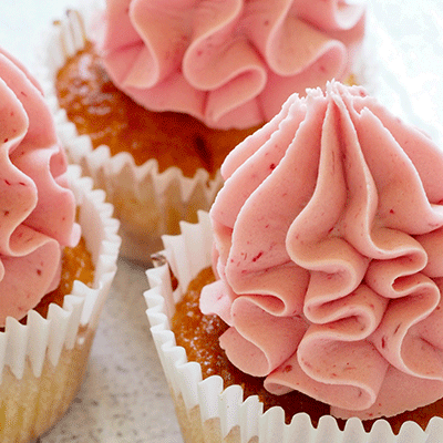 vanilla cupcakes with strawberry frosting